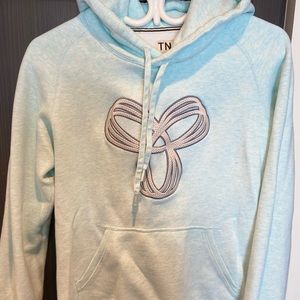Cozy Aritzia TNA logo hoodie in size Medium